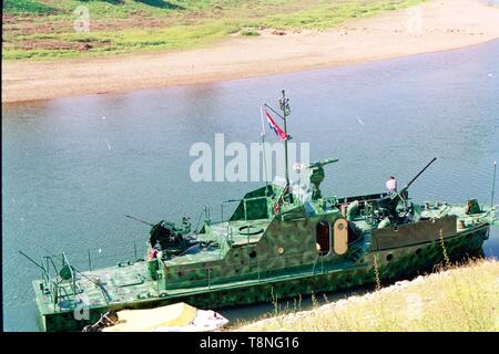 A Croatian Defence Forces patrol boat sat on the river flowing through Osijek during the conflict between Serbia and Croatia in 1991-92. Picture by Adam Alexander Stock Photo