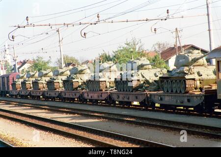 Yugoslav Federal Army tanks on a train at Dobova station on the border between Slovenia and Croatia pictured during the break-up of Yugoslavia in 1991. Picture by Adam Alexander Stock Photo