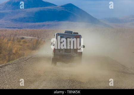 Yakutsk ,Russia, - Sep 06 2017: view of car driving through the forest on country road. Russia Stock Photo