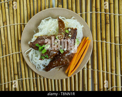 Honey Sriracha Mongolian Beef with Rice Noodles Stock Photo