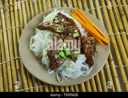 Honey Sriracha Mongolian Beef with Rice Noodles Stock Photo