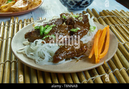 Honey Sriracha Mongolian Beef with Rice Noodles Stock Photo