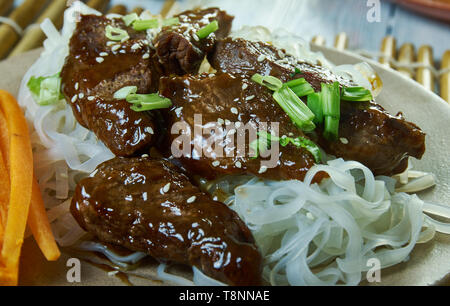 Honey Sriracha Mongolian Beef with Rice Noodles Stock Photo