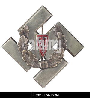 An Honour Badge of the Carpathian German Party Silvered badge in the shape of a swastika with attachment pin, centrally applied red enamel party badge (chipped) within a laurel wreath. Vertical brass attachment pin. Signs of usage. The Carpathian Germans settled in a small enclave in an area of present-day Slovakia and Carpathian Ruthenia. Compared to the Sudeten Germans, they were a disparately smaller ethnic group. A very unusual and rare badge. historic, historical, awards, award, German Reich, Third Reich, Nazi era, National Socialism, object, objects, stills, medal, de, Editorial-Use-Only Stock Photo