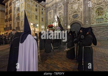 Spain, Aragon Region, Zaragoza Province, Zaragoza, Religious float being carried through the streets during Semana Santa, (Holy Week) celebrations, Church of Santa Isabel de Portugal Stock Photo