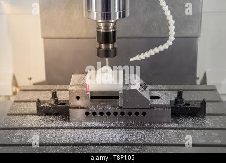 Cutting plastic on CNC milling machine modern processing technology Stock Photo