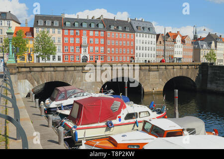 Copenhagen, Denmark - Jun 09, 2012: Canal, bridge and houses on Nybrogade Street Stock Photo