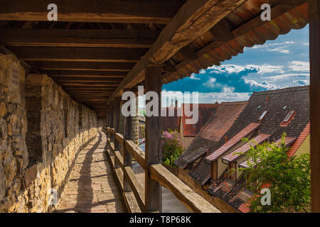 Walk along the battlements of the well preserved medieval town fortification of Rothenburg ob der Tauber, Germany. Great view from the roofed... Stock Photo