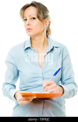 Business woman in blue shirt making notes and behaves strictly - rigorous boss at work - concept on white background Stock Photo
