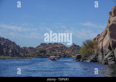 Aswan, Egypt: Launches on Lake Nasser take tourists to Agilkia Island and the relocated temple complex of Philae, built during the Ptolemaic Kingdom. Stock Photo