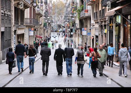 BARCELONA, SPAIN - NOVEMBER 6, 2012: People walk Carrer de Ferran street in Barcelona. According to Mastercard, Barcelona is the 15th most visited cit Stock Photo