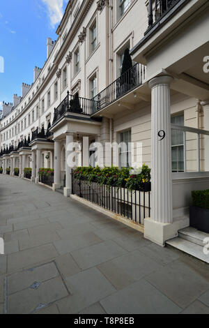 White stucco fronted terrace houses, Moore Street, Chelsea, Royal ...