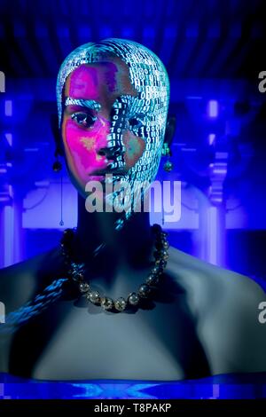 Zeroes and Ones projected onto the face of a mannequin in Tokyo's fancy shopping district Ginza, in March 2019. | usage worldwide Stock Photo