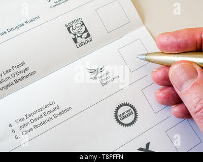 Man voting on ballot paper for  Scottish Liberal Democrats party in European Parliament election, Scotland, May 2019 Stock Photo