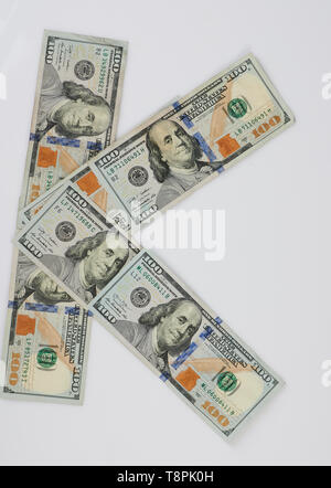 K letter made from dollar bill isolated on white background Stock Photo