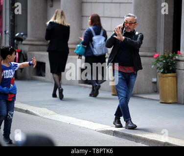 Milan, Bruno Barbieri in the center to shoot a new Masterchef commercial  Chef BRUNO BARBIERI arrives downtown accompanied by two production girls  and heads for ARMANI's restaurant in Via Manzoni, where the