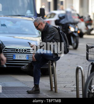 Milan, Bruno Barbieri in the center to shoot a new Masterchef commercial  Chef BRUNO BARBIERI arrives downtown accompanied by two production girls  and heads for ARMANI's restaurant in Via Manzoni, where the