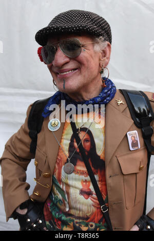 Spanish singer Paco Clavel is seen posing for a picture during the 'Re-inventando Chulap's fashion contest in Madrid. Re-inventando Chulap’s, is celebrated during the festivities in honour of San Isidro Labrador, the contest where fashion designers re-invent the traditional costume of 'Chulapa' and 'Chulapo'. Stock Photo