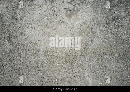 Monochromatic Texture of Old Weathered Concrete Wall with Cracks and Water Stains Stock Photo