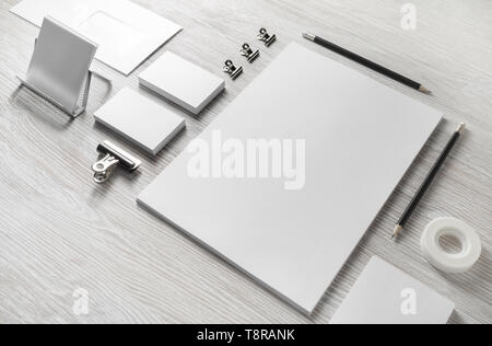 Blank white stationery set. Business brand template on light wood table background. Stock Photo