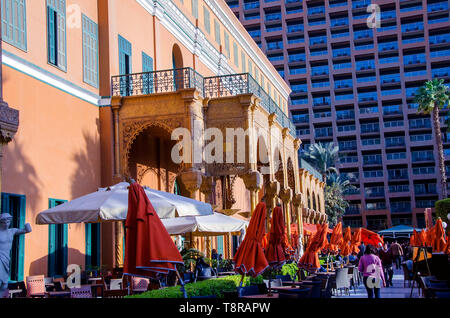 Cairo Marriott Hotel & Omar Khayyam Casino exterior dining patio with umbrellas, Zamalek Egypt Stock Photo