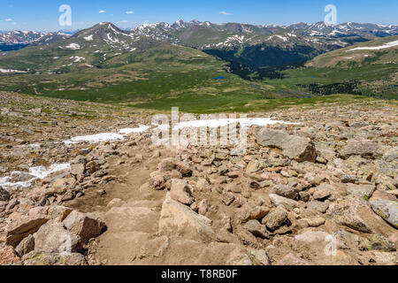 Rugged Mountain Trail - Springtime on a rugged and steep mountain trail, Mount Bierstadt Hiking Trail, in Front Range of Rocky Mountains, Colorado, US. Stock Photo