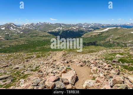 High Mountain Trail - Spring view of rugged and steep Mount Bierstadt Hiking Trail high up at Front Range of Rocky Mountains, Colorado, USA. Stock Photo