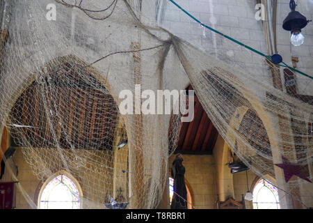 Fishnets, Saint-Pierre du Crotois church, Le Crotois, Bay of Somme,  Hauts-de-France, France Stock Photo