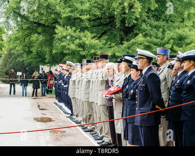 STRASBOURG, FRANCE - MAY 8, 2017: Side view of large group of military personnel at ceremony to mark Western allies World War Two victory Armistice in Europe  victory over Nazi  Stock Photo