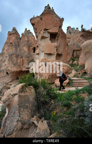 Outdoor museum of unusual rock formations with caves in Cappadocia, Turkey Stock Photo