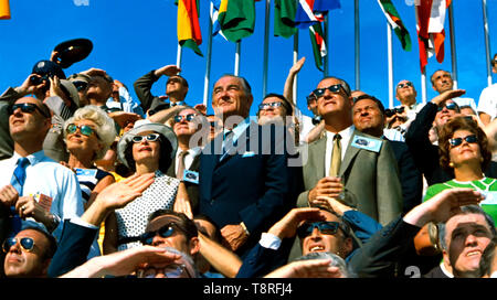 Former President Lyndon B. Johnson (on the left, without sunglasses) and Vice President Spiro Agnew (right, center) view the liftoff of Apollo 11 from pad 39A at Kennedy Space Center at 9:32 am EDT on July 16, 1969. July 16, 1969 Stock Photo