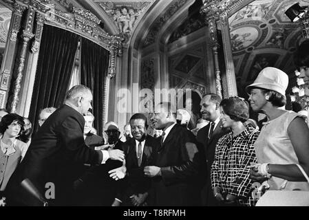 President Lyndon B. Johnson meets with Martin Luther King, Jr. at the signing of the Voting Rights Act of 1965, August 6 1965 Stock Photo