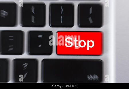 Stop word on button of computer keyboard Stock Photo