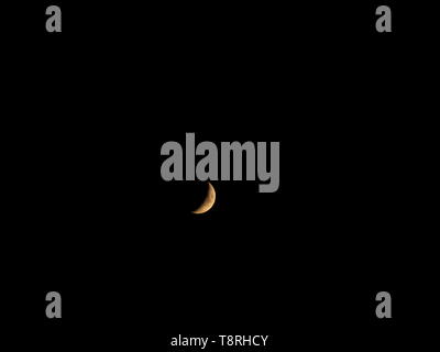 moon's waxing crescent on July sky in northern hemisphere Stock Photo