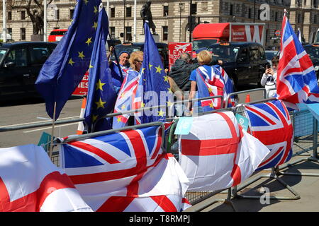 London, UK. 14th May 2019. Small groups of pro-EU and Brexit supporters demonstrate peacefully in front of the House of Parliaments in Westminster. Credit: Uwe Deffner / Alamy Live News Stock Photo