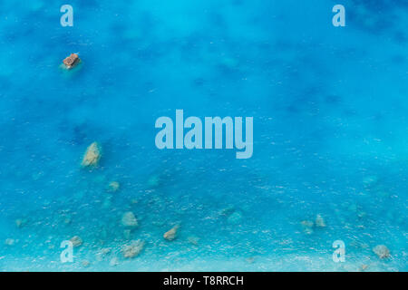 Aeriel view of transparent clean sea water with rocks, beautiful nature background Stock Photo