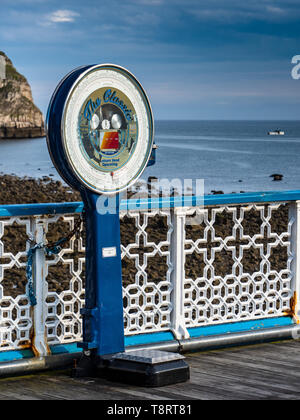 Traditional Weighing Machine on Llandudno Pier, a Grade II* listed pier in the seaside resort of Llandudno, North Wales UK, opened 1877. Stock Photo