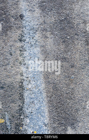 Rough texture in stone, gray with blue stripes, as a nature background Stock Photo
