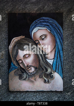 Mary watches over the body of Jesus who died on the cross, religious art