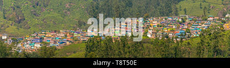 Horizontal panoramic view of the colourful New Colony in Munnar, India. Stock Photo