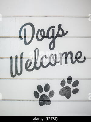 Retro Vintage Style Dogs Welcome Sign On A Wooden Wall Of A Cafe Or Restaurant Or Hotel Stock Photo