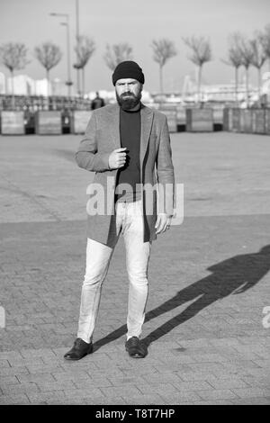 Hipster outfit. Stylish casual outfit for fall and winter season. Menswear  and male fashion concept. Man bearded hipster stylish fashionable coat.  Comfortable and cool. Masculine casual outfit Stock Photo by ©stetsik  230067260