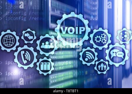 VoIP Voice over IP on the screen with a blur background of the server room. The concept of Voice over Internet Protocol. Stock Photo