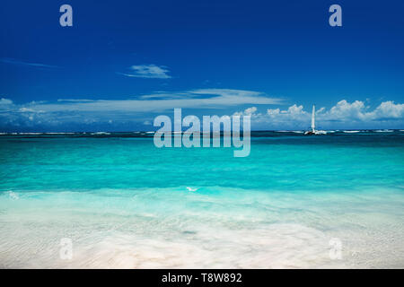 Beautiful carribean sea and boat , panoramic view from the beach Stock Photo