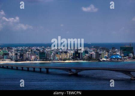 On this unique photo you can see the capital of the Maldives Male from above. You can see very well how a city looks in the smallest of spaces Stock Photo