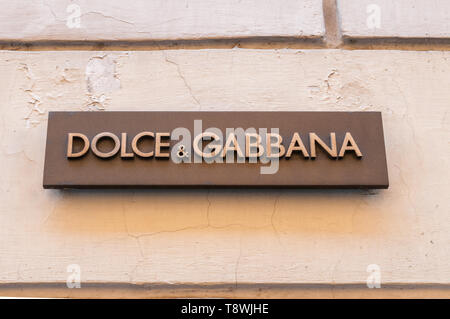ROME, ITALY - SEPTEMBER 4, 2010: The sign of the brand Dolce & Gabbana at the wall of the  fashion store  on the Via dei Condotti  in Rome on septembe Stock Photo