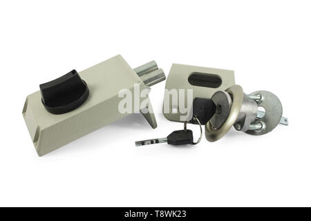 Mechanism of the door lock with the keys in the disassembled form Isolated on white Stock Photo