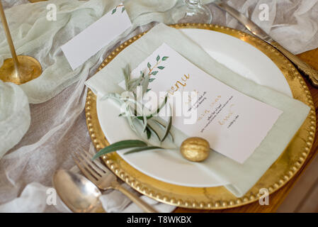 Rustic wedding table set. vintage dining table with decorations, flowers. Boho style. Table set for an event, party, date or wedding Stock Photo