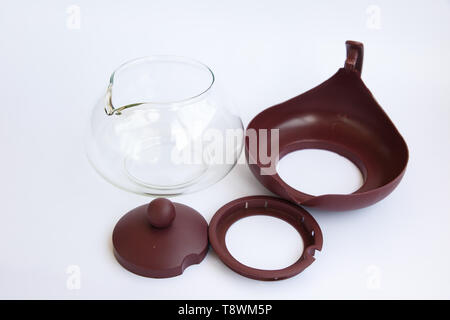 Empty glass teapot on white background Stock Photo