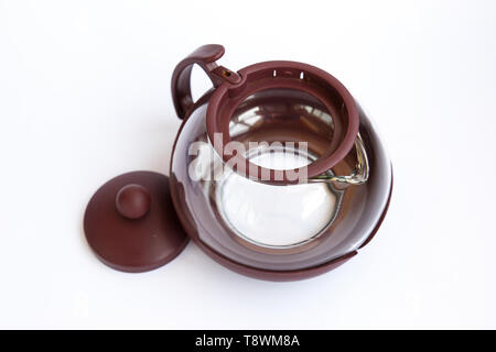 Empty glass teapot on white background Stock Photo